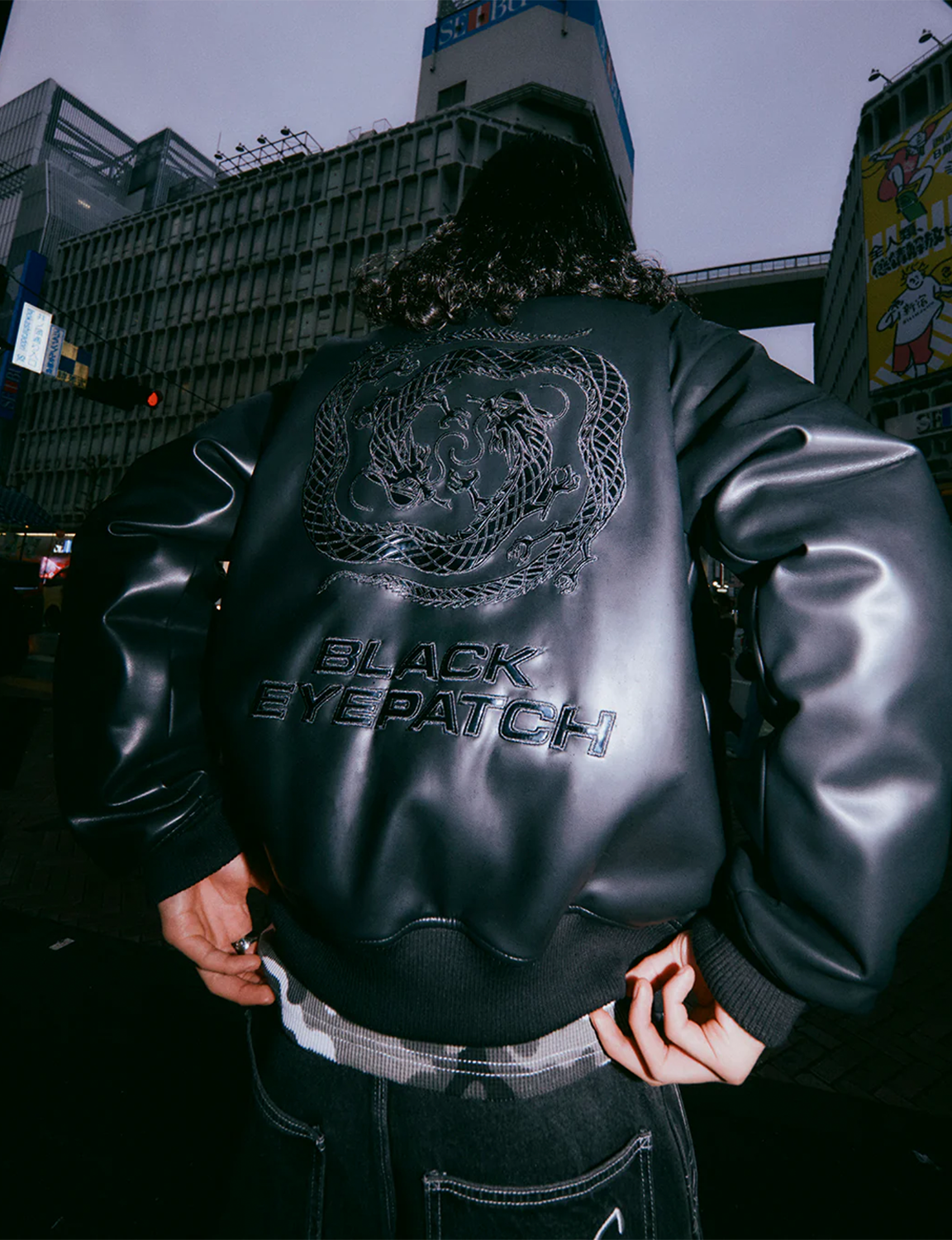 DRAGON SWIRL LOGO FAUX LEATHER JACKET